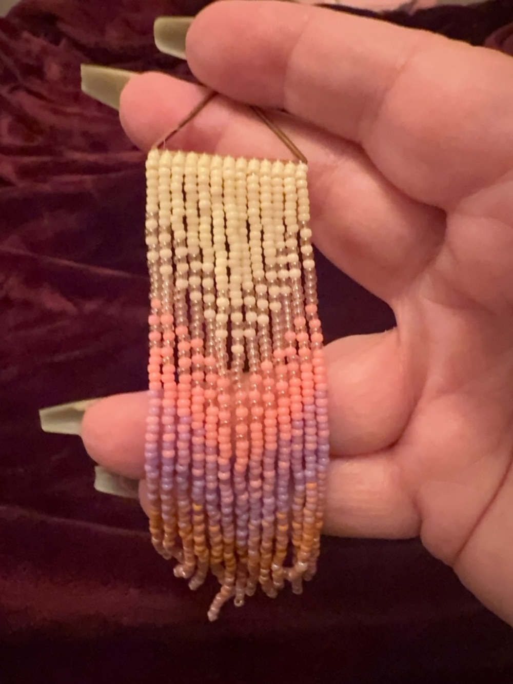 Hand beaded drop earrings by nationally renowned Métis artist @bread_n_butter.